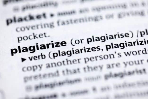 A close-up of the “plagiarism” dictionary definition.