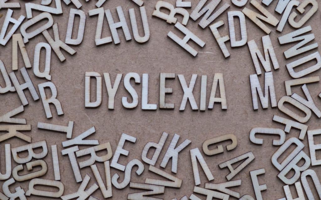 ‘Dyslexia’ spelled out in letters surrounded by other letters.